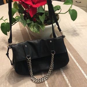 Carlos Santa crossbody purse. Color black. Only used couple of times.